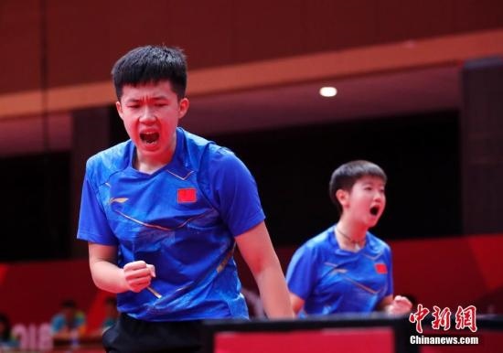 資料圖：雅加達(dá)亞運(yùn)會(huì)，王楚欽/孫穎莎奪得混雙冠軍。 <a target='_blank' href='/'>中新社</a>記者 劉關(guān)關(guān) 攝