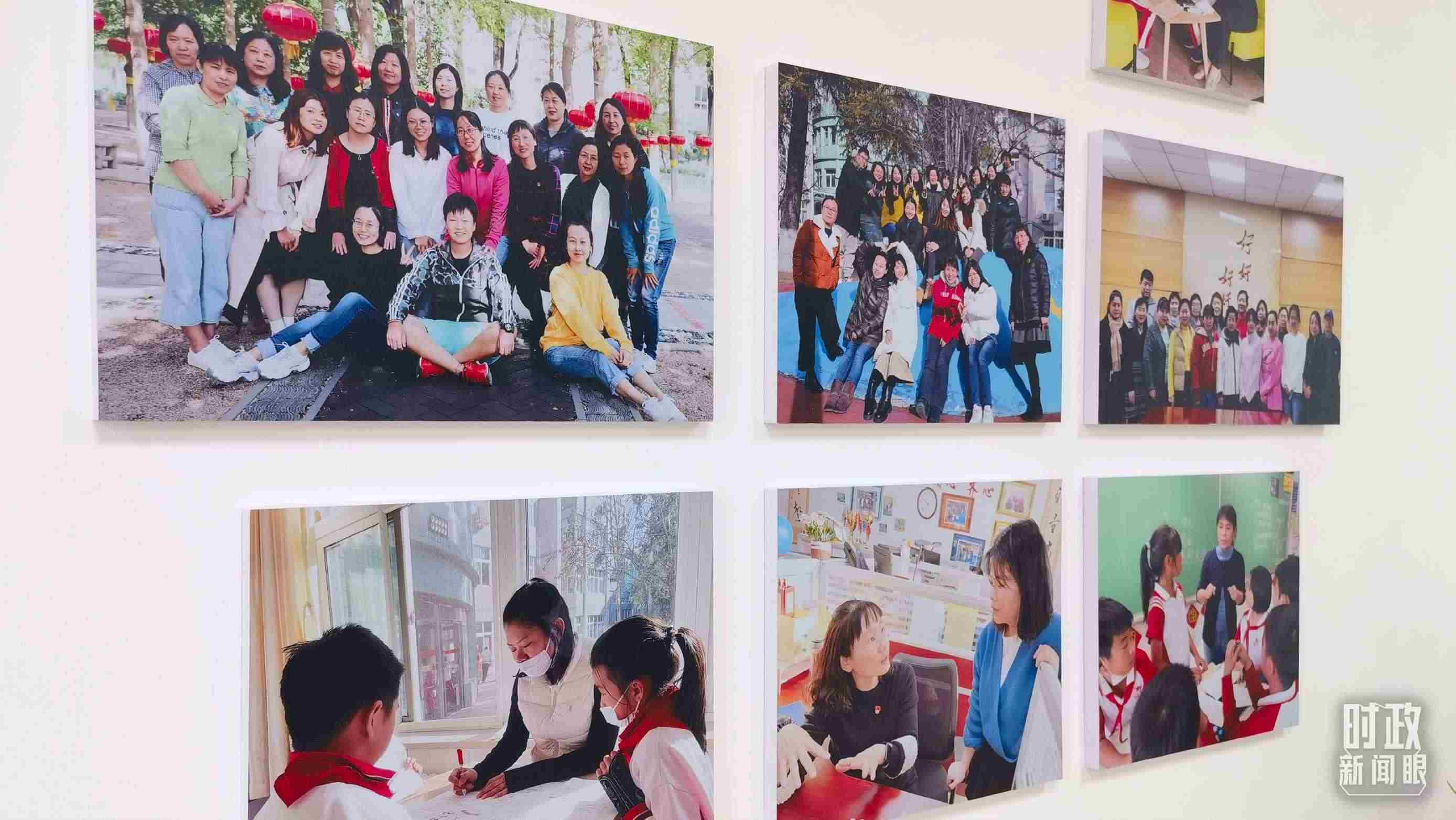 △五年級教師辦公室內(nèi)的合影展板。（總臺央視記者賈林拍攝）