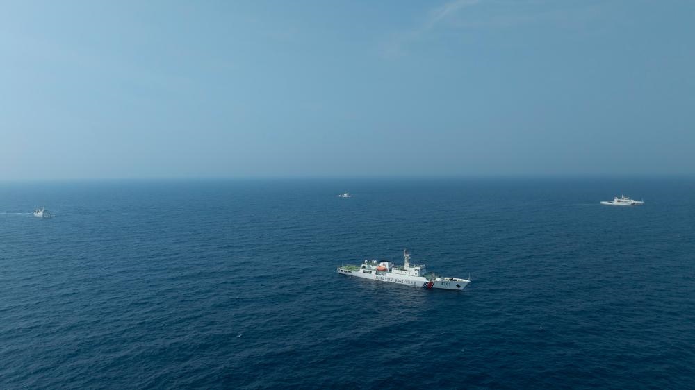 4月22日，中越海警艦艇編隊在北部灣海域開展聯(lián)合巡邏。（中國海警供圖）